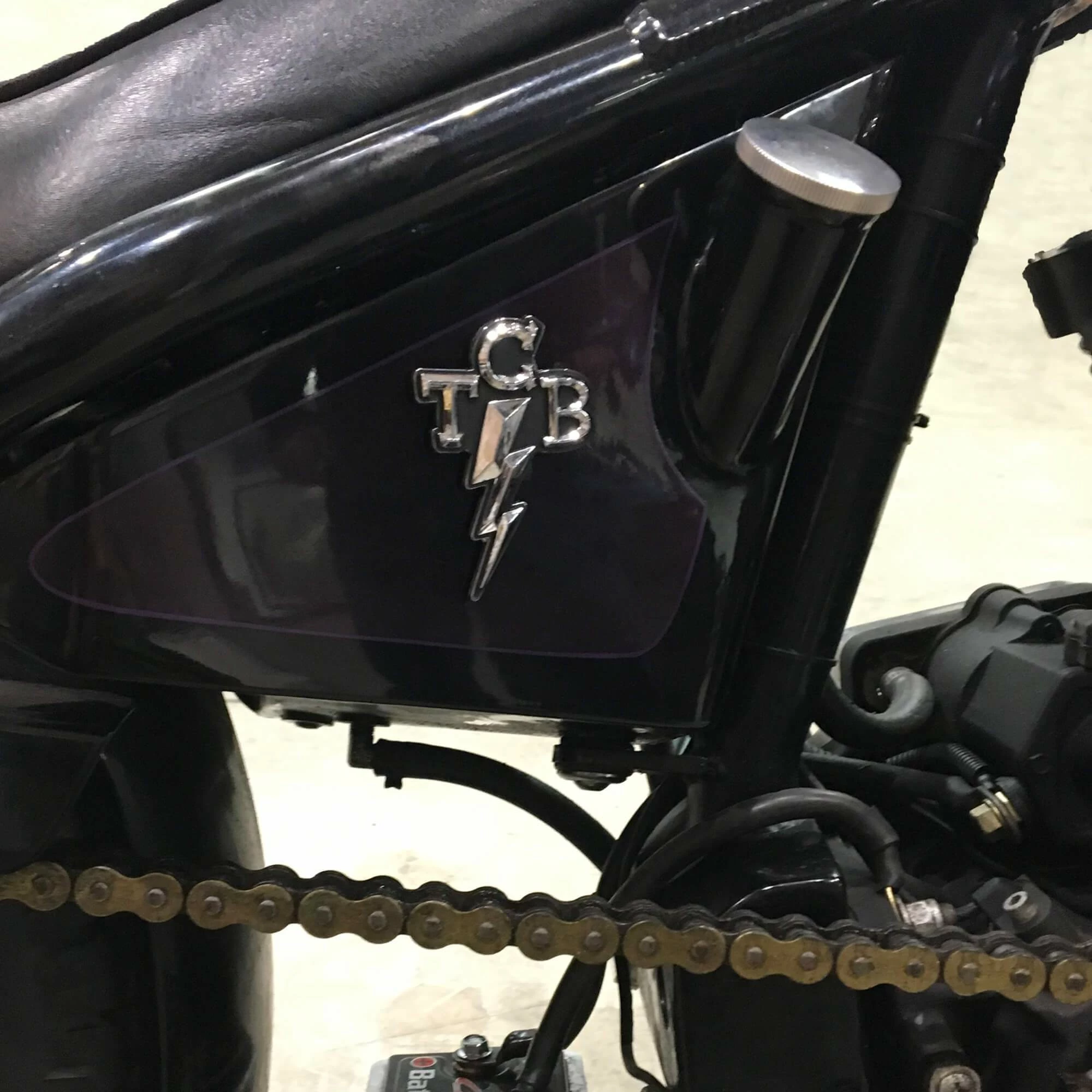 Lowbrow Customs TCB Takin' Care Of Business Chrome Stick-On 3D Emblem 4 Lowbrow Customs TCB Takin' Care Of Business Chrome Stick-On 3D Emblem - Image 4